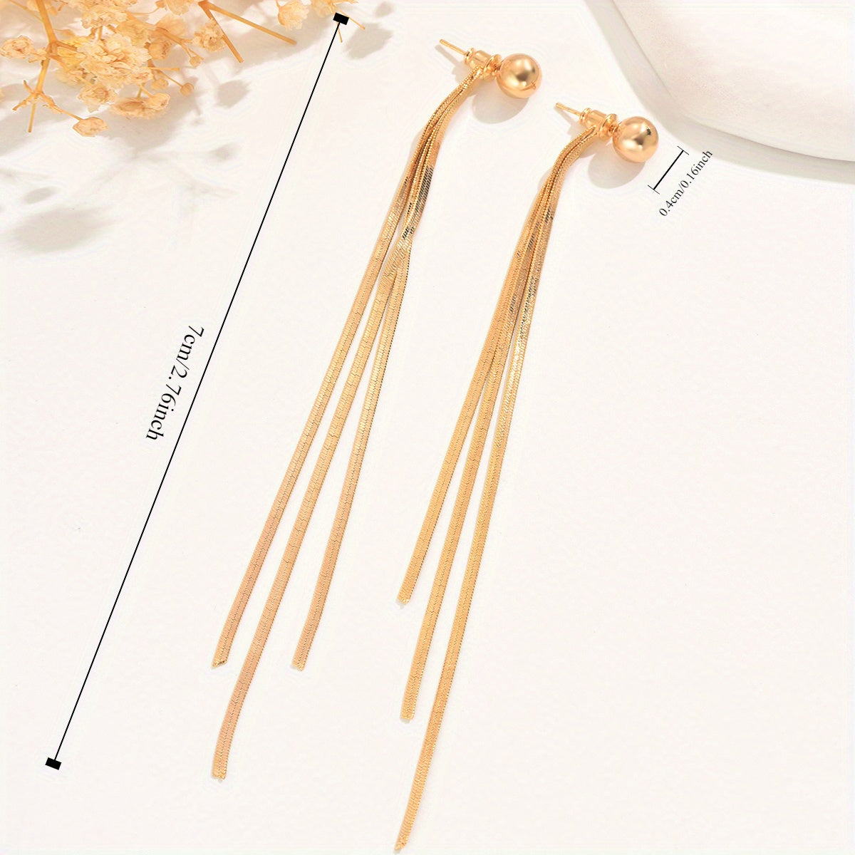 A pair of golden gold-plated jewelry tassels with creative design, elegant, fashionable, simple and versatile earrings, perfect choice for daily gift giving and party wearing for girls and women